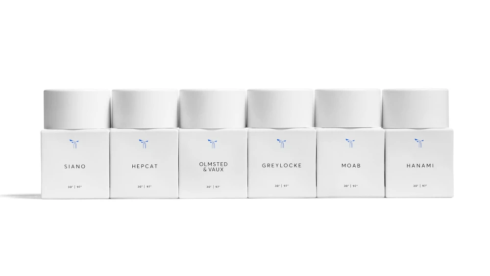 Phlur fragrance bottles from its original launch were opaque white with squared sides. 